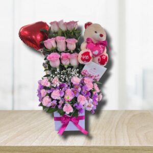 Arreglo floral con peluche cali